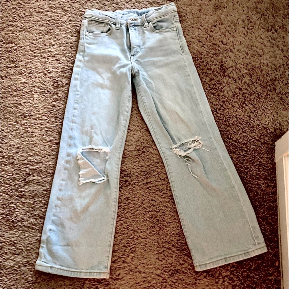 Size 8, ripped jeans